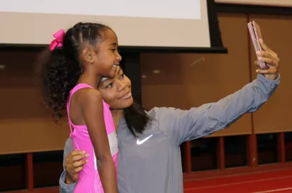 Gabby Douglas with gymnast