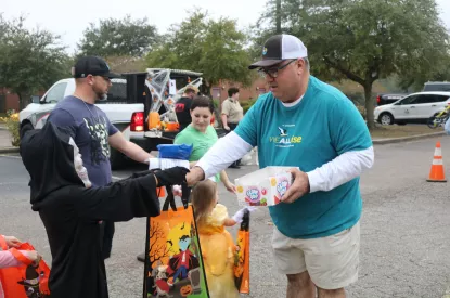 Mayor Habib handing out candy